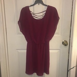 Cute dress with adorable back detail!